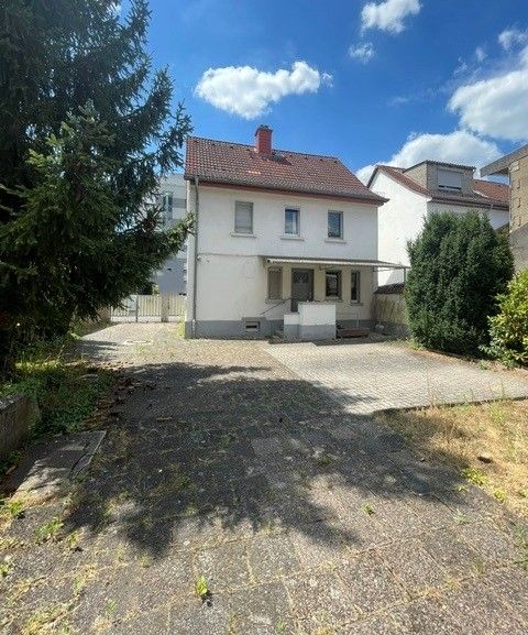 Zweifamilienhaus mit großer Scheune in zentraler Lage von Sprendlingen